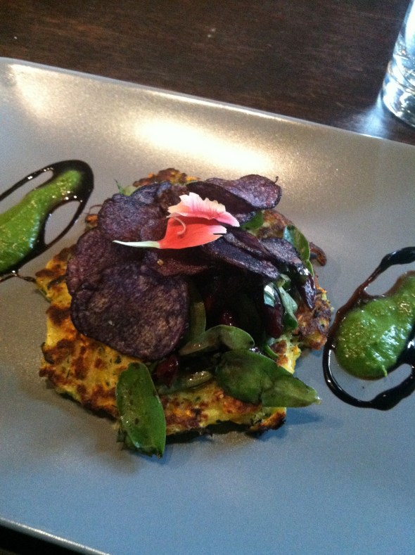 Third Course: Mung Bean Zucchini Cake topped with  Cherry Basil Salad and Blue Potato Chips